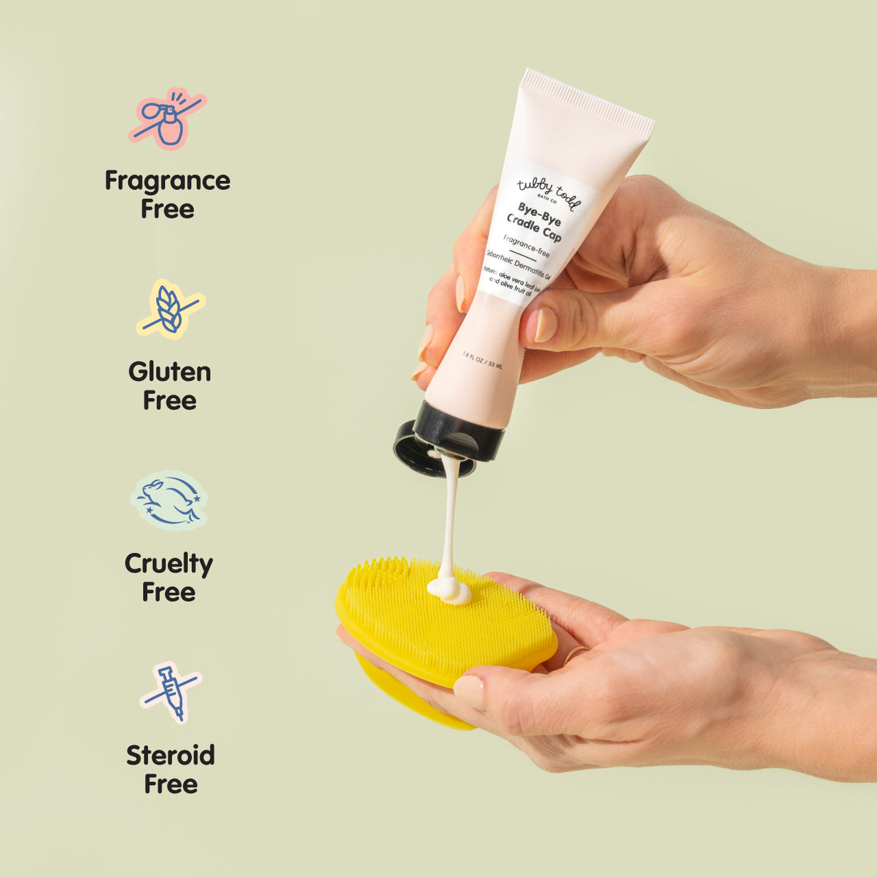 Hand applying cream from a tube onto a yellow scrub brush, against a light green background. Fragrance-free, Gluten Free, Cruelty Free and Steroid Free claims